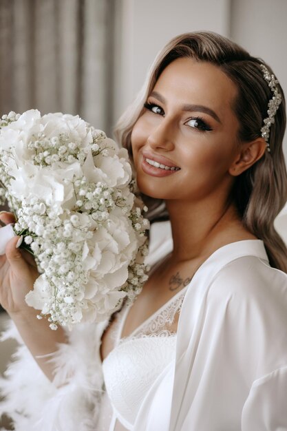 Foto la novia con su ramo de flores