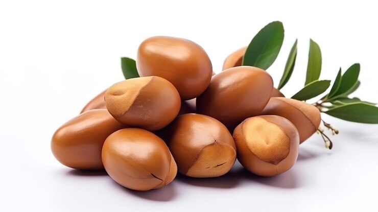 Nueces de aceite de argán con fondo de cosmética vegetal y aceites naturales Generative Ai