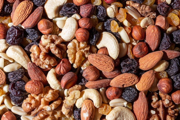 Foto nueces mixtas almendras nueces caju maní cacahuetes avellanas ciruelas secas y pasas