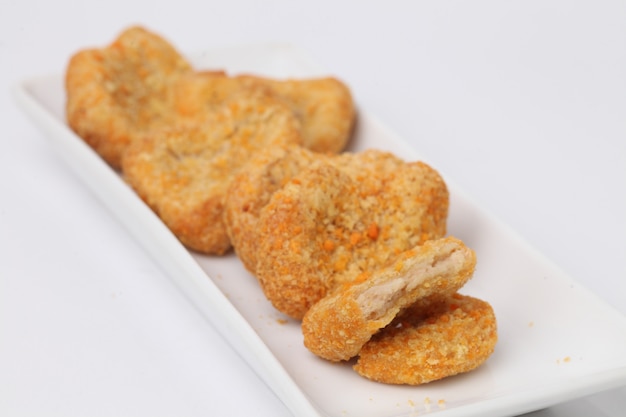 Nuggets de pollo en espacios en blanco