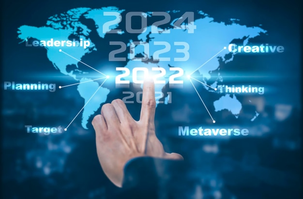 Número de toque comercial año nuevo 2021 - 2022, mapa que navega por el mundo virtual, análisis comercial y financiero, nueva planificación, nuevo presupuesto, metaverso en 2022, idea de pensamiento y creatividad, negocio objetivo