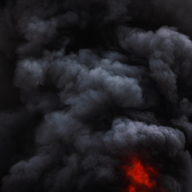 Nuvens negras dramáticas de forte fumaça de fogo cobriam o céu. Desfocagem e borrão de movimento do fogo e alta temperatura das chamas. Fumo e dispersão natural atmosférica.