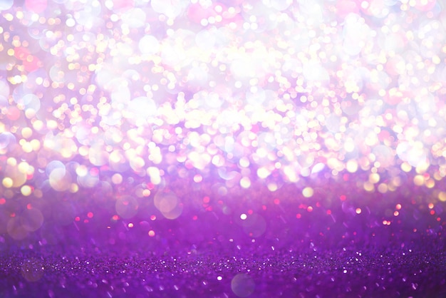 Foto o brilho roxo ilumina o fundo do sumário do bokeh da textura. desfocado