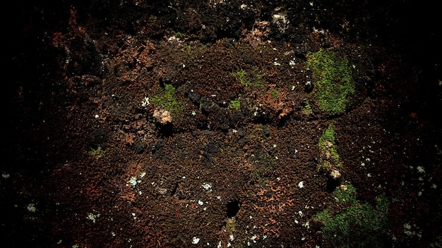 O cimento escuro do fundo da textura da parede de concreto está cheio de manchas e arranhões