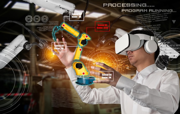 O engenheiro controla os braços robóticos por meio da tecnologia de realidade aumentada da indústria