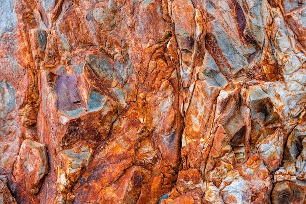 O fundo abstrato das montanhas tonificadas textura basalto vulcânico como na rocha colorida brilhante da Islândia