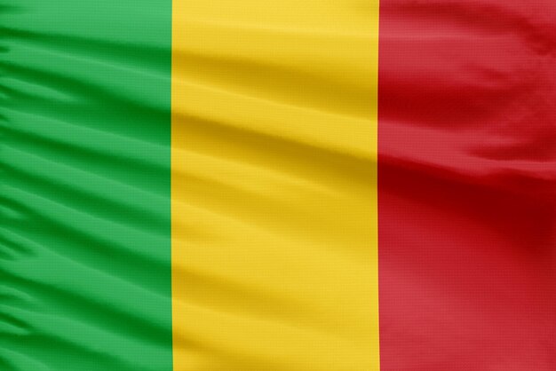O fundo da bandeira do Mali é retratado em um tecido de tecido de costura esportiva com dobras