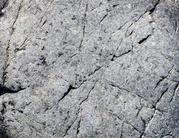 O fundo de pedra preto cinza escuro ou textura. Foco seletivo