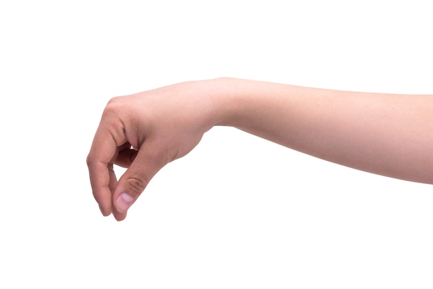 O gesto do dedo de uma pessoa significa um pequeno beliscão isolado na parede branca