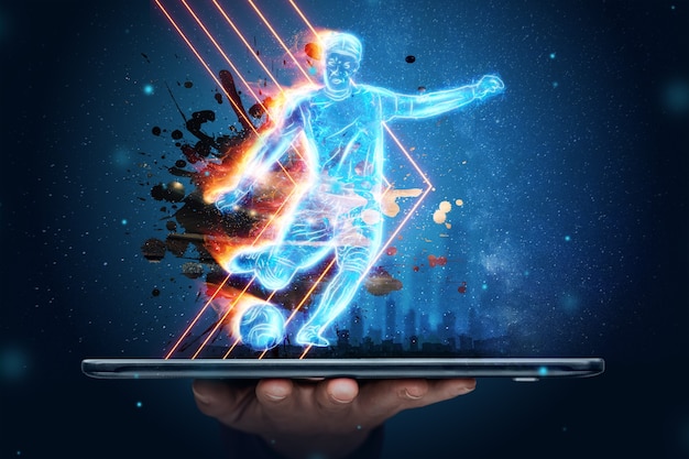 Foto o holograma de um jogador de futebol saindo da tela do smartphone. o conceito de apostas esportivas, futebol, jogos de azar, transmissão online de futebol.