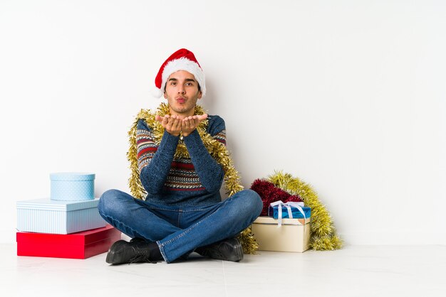 O homem novo no dia de Natal imprimiu guardar o espaço da cópia na palma.