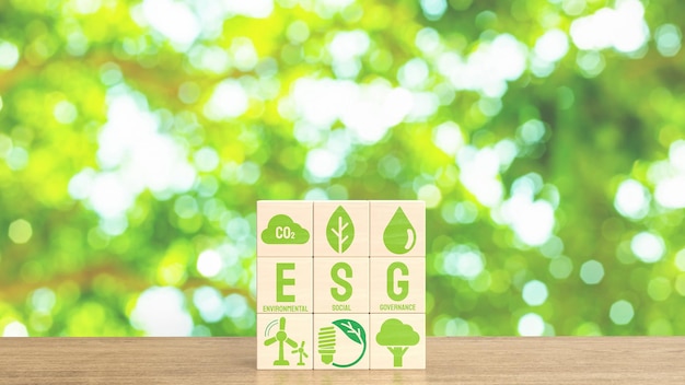 O ícone esg e eco no cubo de madeira para renderização 3d do conceito ecológico