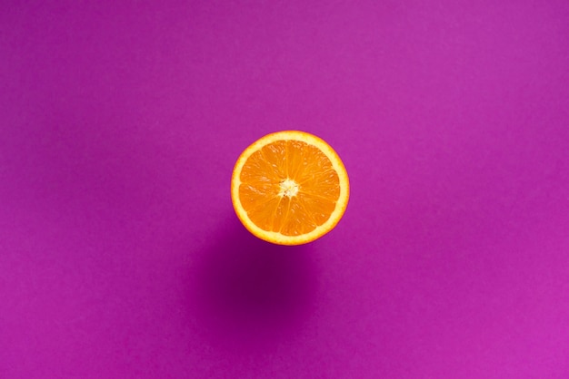 O laranja é um fundo de frutas tropicais ultravioleta