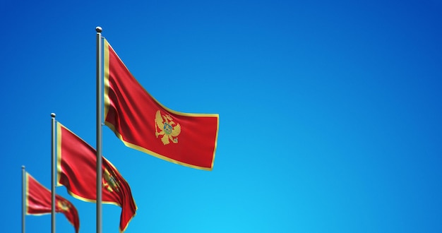 O mastro da bandeira 3D voando em Montenegro no céu azul