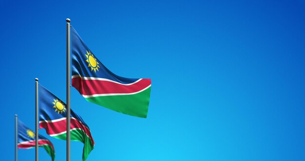 O mastro da bandeira 3D voando na Namíbia no céu azul