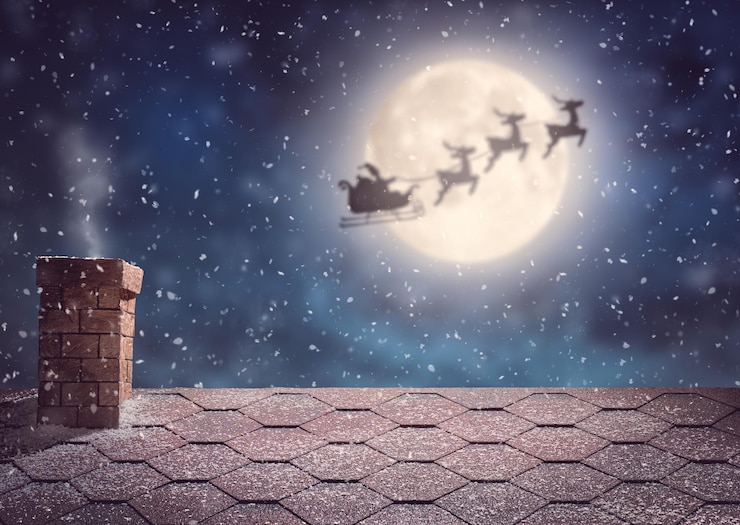 Foto o papai noel a voar no seu trenó.