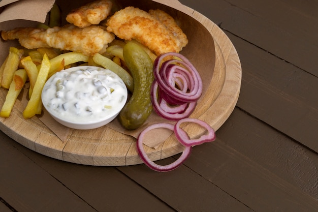 O peixe e batatas fritas. Um prato tradicional Inglês.