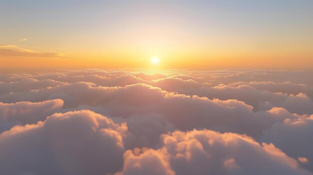 O sol a pôr lança um brilho dourado nas nuvens abaixo as nuvens são macias e fofas e parecem feitas de algodão doce