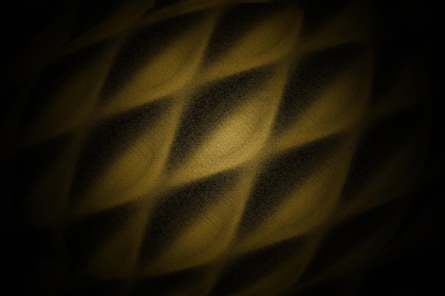 O tecido elíptico arredondado amarelo sombreia o plano de fundo texturizado