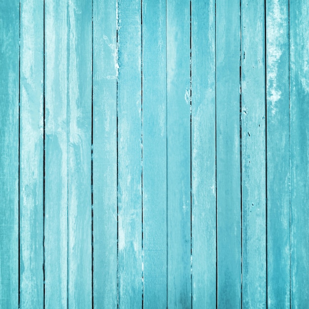 O vintage pintou o fundo de madeira da parede, textura da cor pastel azul com superfícies naturais para o trabalho de arte do projeto.