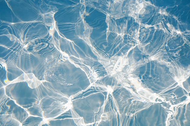 Oberfläche der blauen Swimmingpoolbeschaffenheit, Hintergrund des Wassers im Swimmingpool