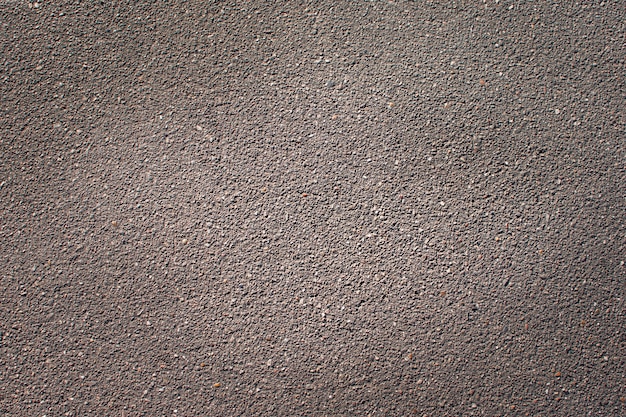 Oberflächen-grunge rau von asphalt, asphalt grau körnige straße, textur hintergrund, draufsicht.
