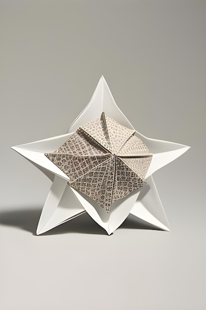 Foto objeto parecido a una estrella en origami sobre un fondo claro