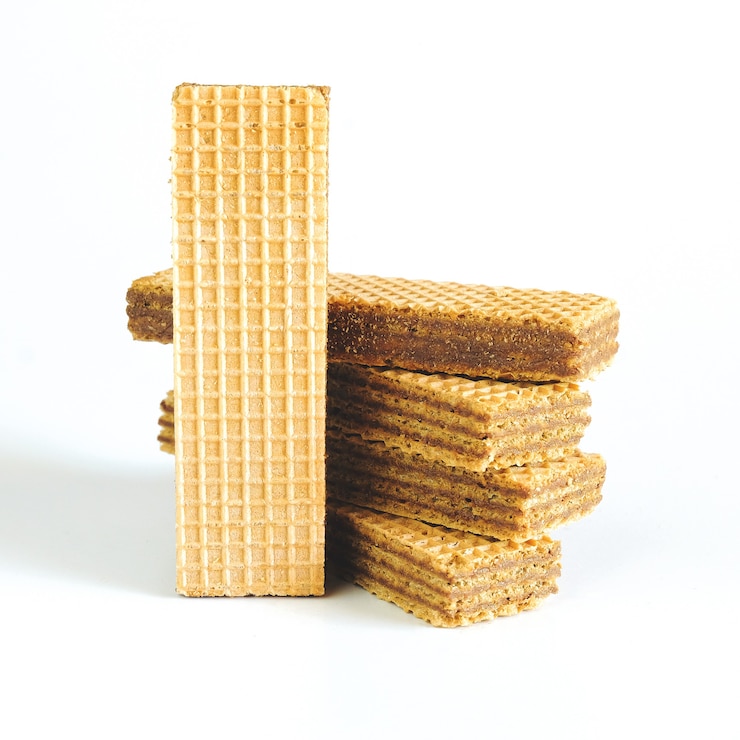 Foto obleas con chocolate sobre fondo blanco. salud alimentaria.
