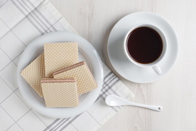 Obleas con relleno y café