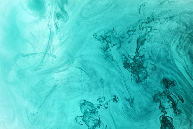 Oceano azul esverdeado abstrato, pintura no fundo da água. redemoinho de salpicos e ondas em movimento. Papel de parede de arte fluida, cores vibrantes líquidas