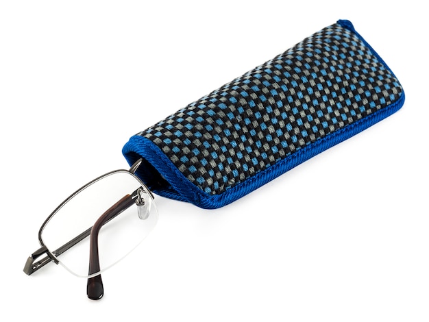 Foto Óculos de metal pretos em um estojo de pano azul