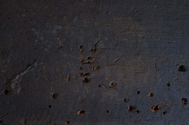 Foto Öl befleckt und bohrloch auf altem holz