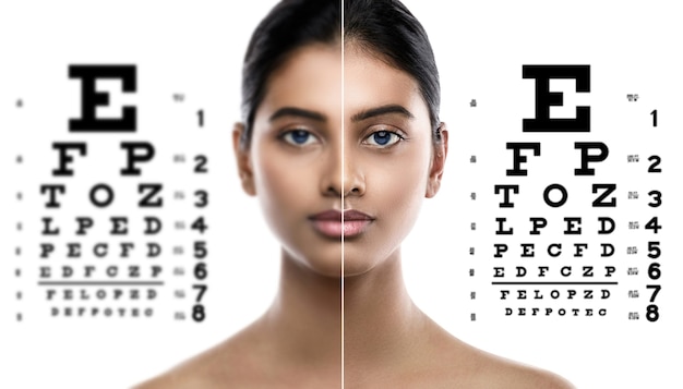 Oftalmología - Mujer india y tabla optométrica para examen de la vista.