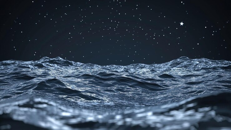 olas del océano bajo el cielo estrellado de la noche