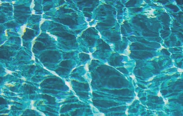 Onda de ondulação abstrata e superfície de água turquesa clara na onda de água azul da piscina para backgrou