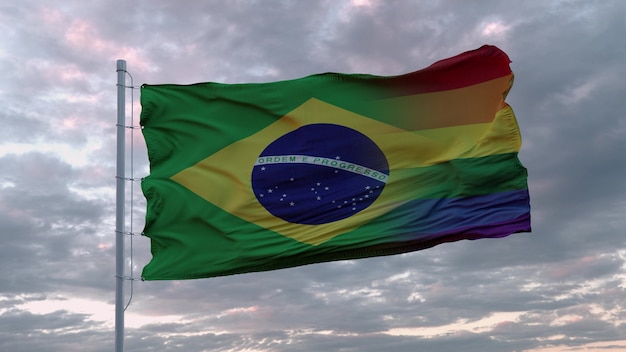 Ondeando la bandera del estado de Brasil y la bandera del arco iris LGBT