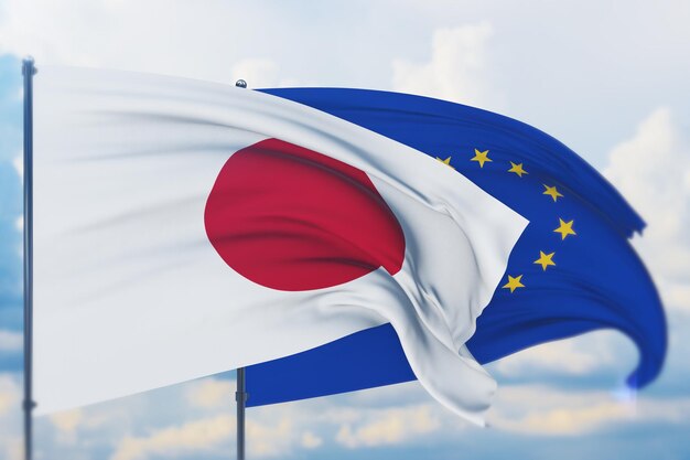 Ondeando la bandera de la unión europea y la bandera de japón vista de cerca d ilustración