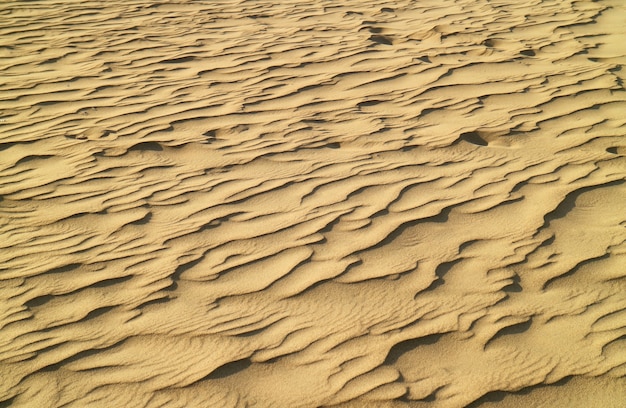 Ondulações incríveis de areia na duna de huacachina na região de ica, peru, américa do sul