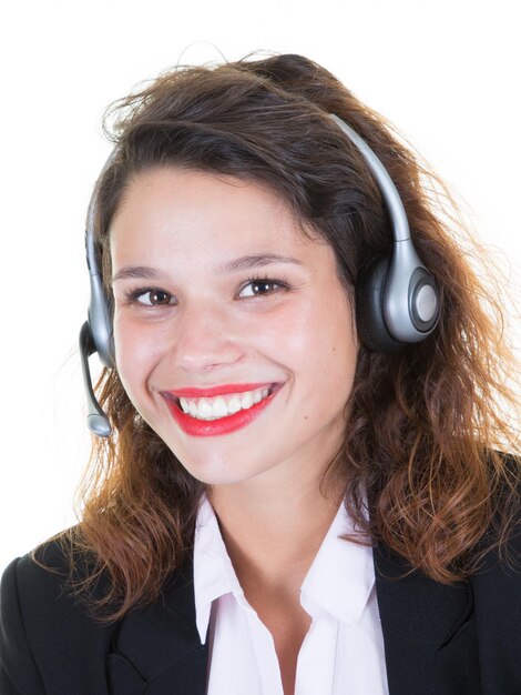 Operadora de linha de apoio ao cliente com representante de serviço de fone de ouvido trabalhando com fone de ouvido