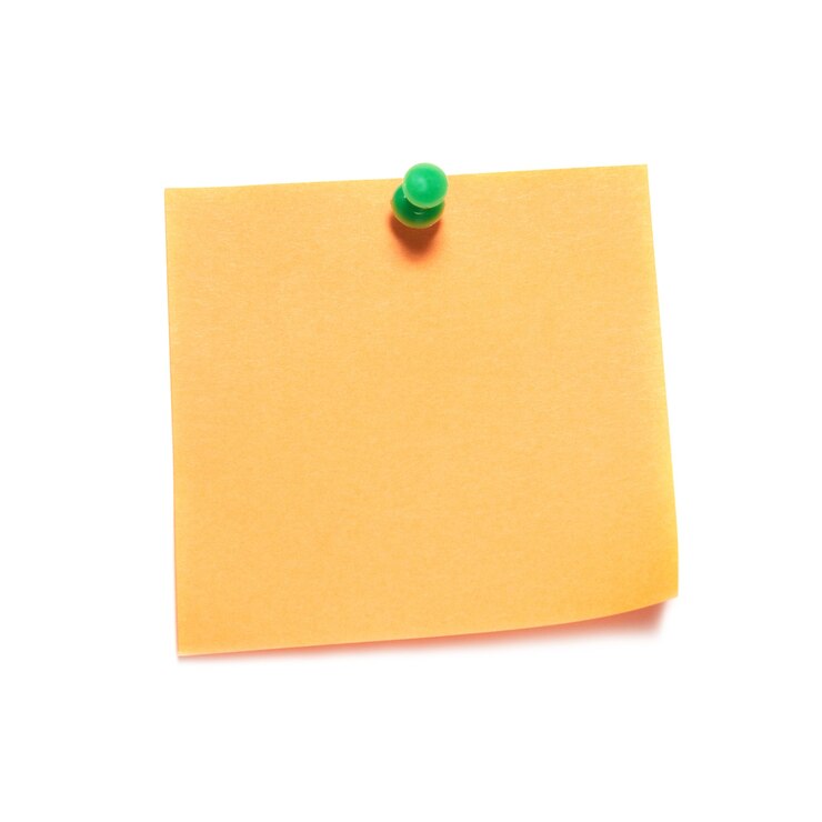 Orange Note mit Tack auf Weiß isoliert