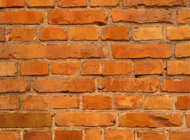 Orangefarbene Mauer. Brickwall-Hintergrund, alte Vintage-Textur.