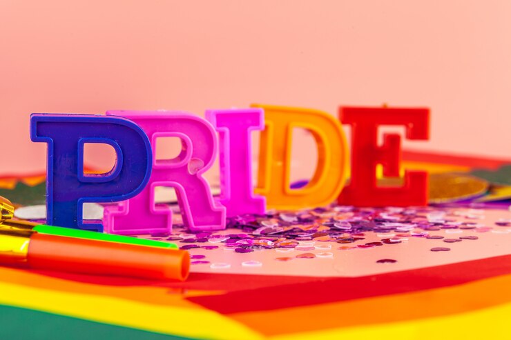 Foto orgullo de texto, con bandera arcoiris lgbt