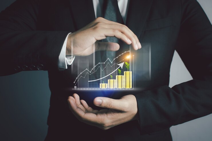 Foto os empresários estão usando uma tecnologia inovadora de gráfico de ações. mídia mista, conceito digital e online.