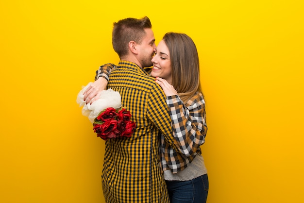 Paar im Valentinstag mit Blumen