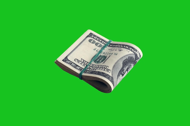 Pacote de notas de dólar americano isoladas em chroma keyer verde Pacote de dinheiro americano com alta resolução em máscara verde perfeita