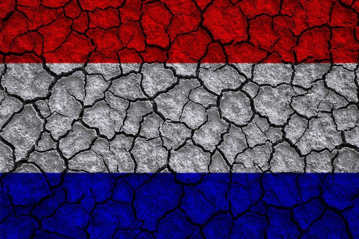 Foto padrão de bandeira da holanda na textura do solo de fenda estilo retro vintage