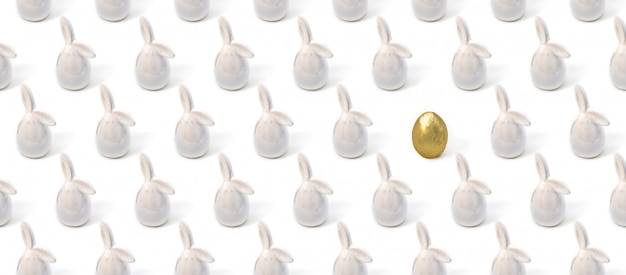 Padrão de Páscoa feito de coelho branco lebres brinquedos e ovo de ouro no estilo de geometria.