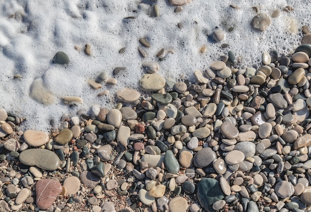 Foto padrão de rochas e pedras na praia