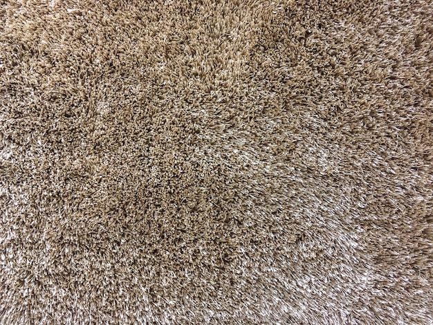 Padrão de superfície abstrata closeup tecido no fundo de textura de tapete de tecido marrom