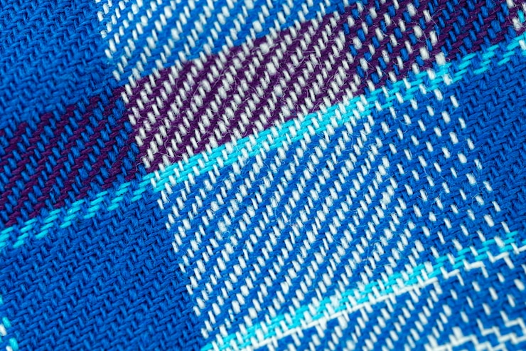 Foto padrão de tartan azul e fundo de close-up de textura de tecido com alta resolução